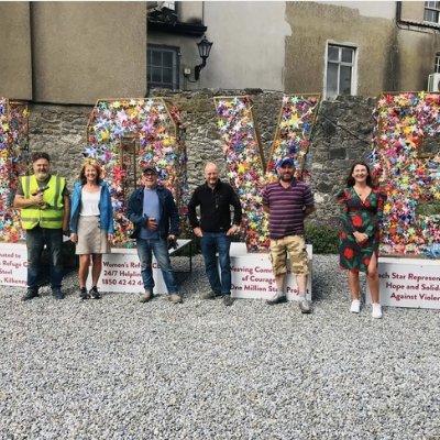 Ireland Star Weavers & Amber Women's Refuge installing LOVE display